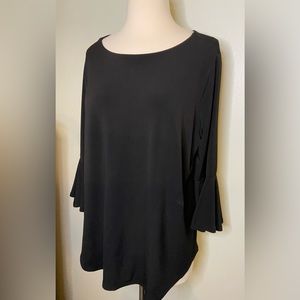 Beautiful black top. XL. Stretch.  flare sleeves for dressing it up a little